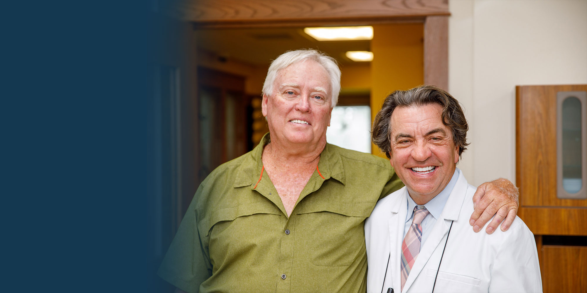 Dr. David Painter with patient smiling